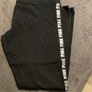 Pink Victoria’s Secret black leggings with silver pink logo down the legs size L